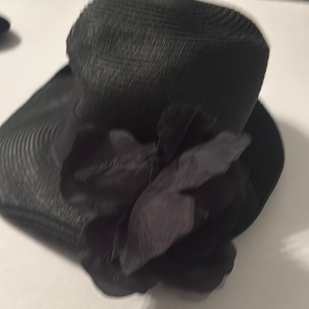 Elegant Black Hat with Floral Accent